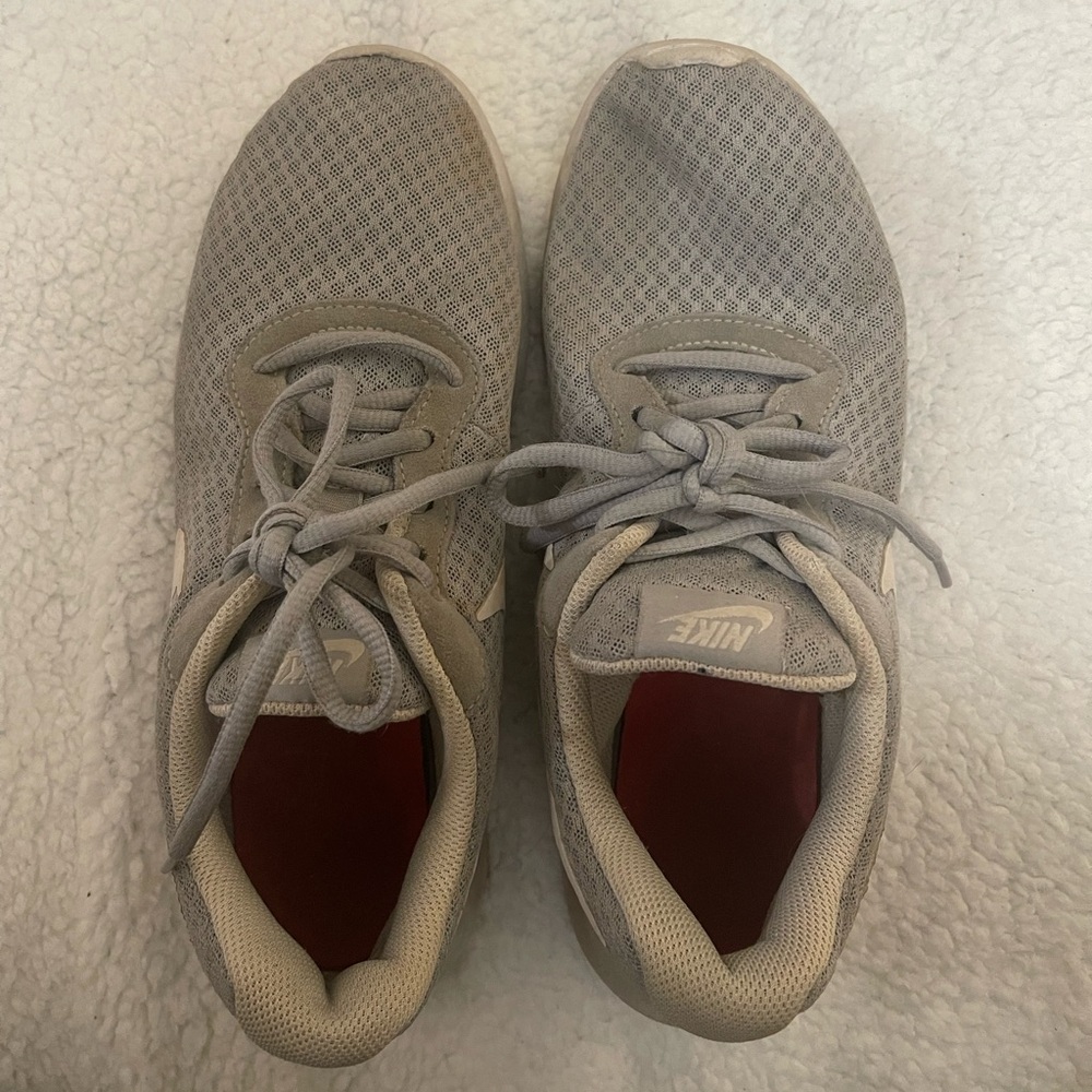 Grey Nike runners